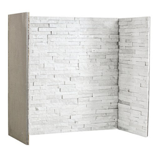 White quartz fireplace chamber lining set on white wall