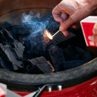Lighting coals on a BBQ